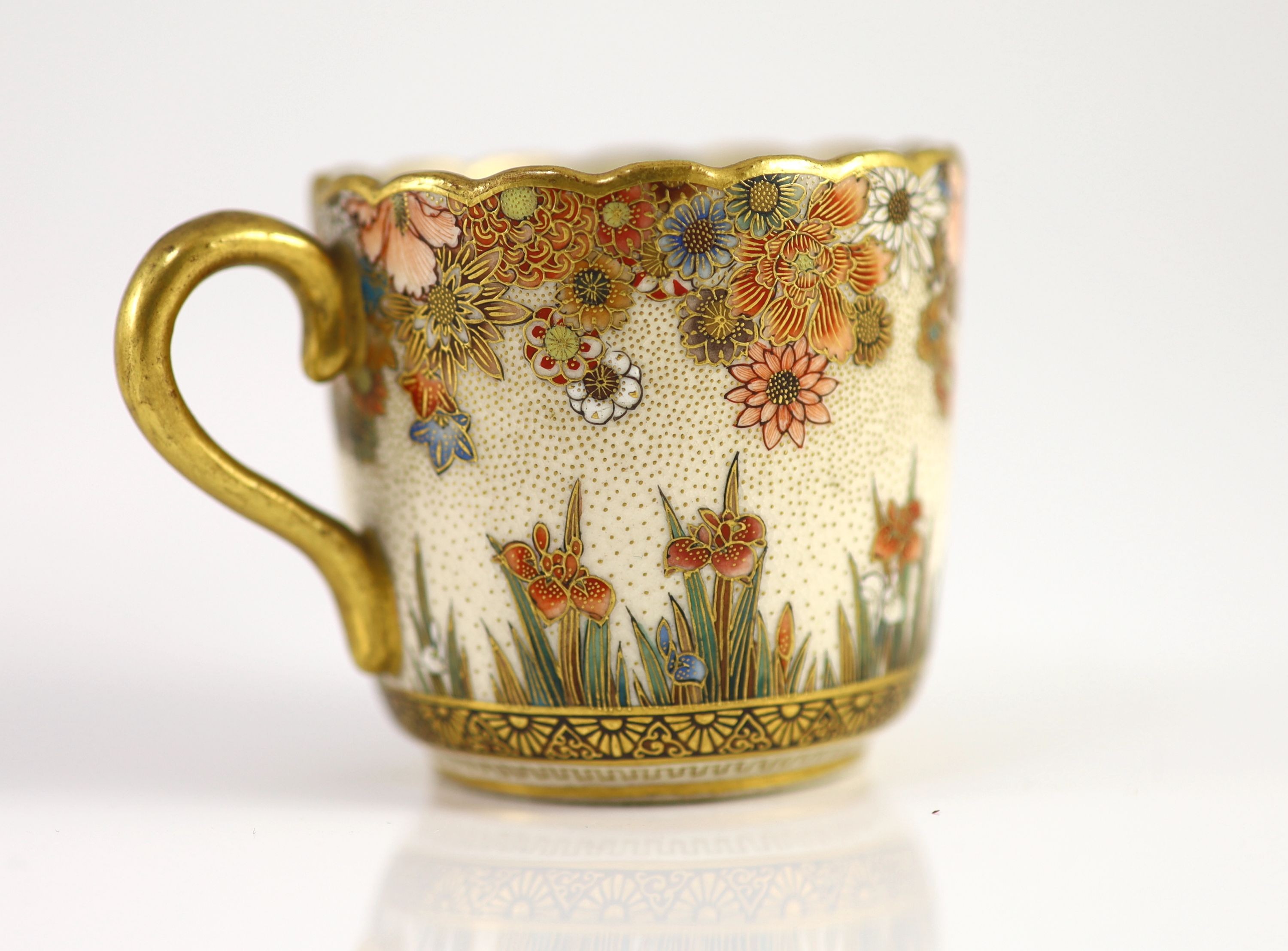 A Japanese Satsuma pottery cup and saucer, signed Seikozan, Meiji period, 11cm diameter